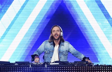 David Guetta's Parisian Extravaganza: A Symphony of EDM, Lights, and Unforgettable Memories!